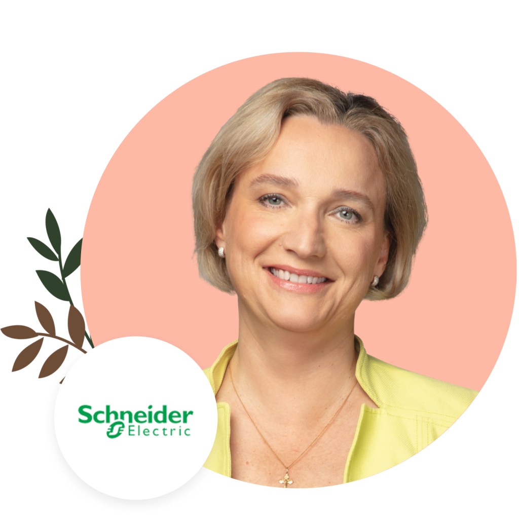 Smiling VP of Sales Management and Support with Schneider Electric logo
